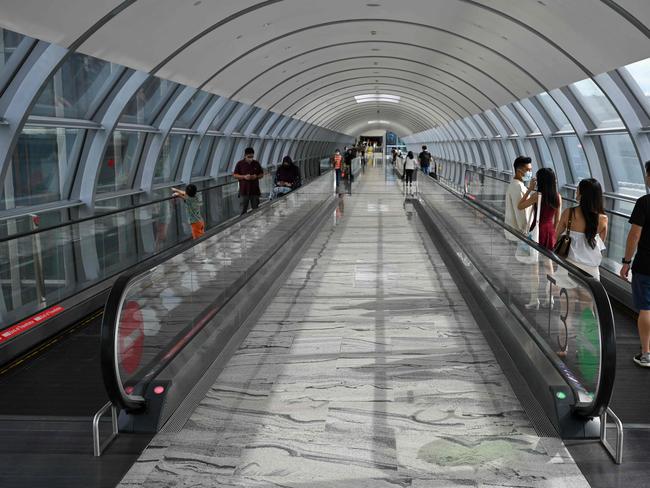 A handful of passengers at Changi Airport in Singapore last month. Picture: on September 8, 2021. Picture: AFP