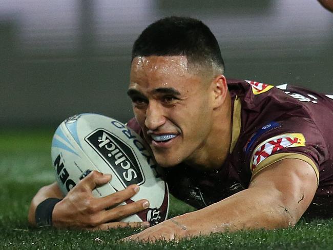 Valentine Holmes of the Maroons scores a try during Game 3 of the 2018 State of Origin series between the NSW Blues and the Queensland Maroons at Suncorp Stadium in Brisbane, Wednesday, July 11, 2018. (AAP Image/Jono Searle) NO ARCHIVING, EDITORIAL USE ONLY