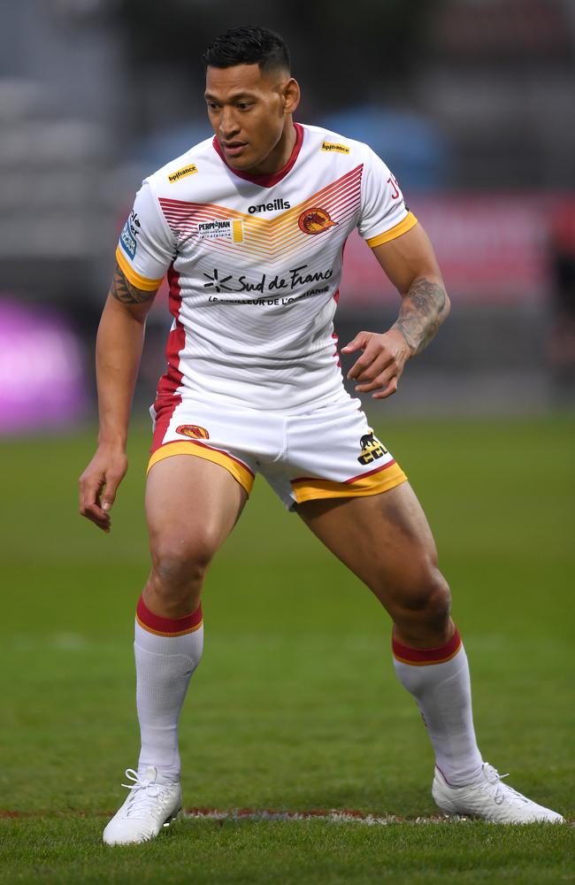 Israel Folau warms up for his comeback this morning. Picture: Getty