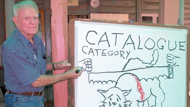 Sketch artist Tony Turton from Kingaroy produces one of his cat cartoons at the Bunya Picnic. Photo Ray Humphrys / Dalby Herald