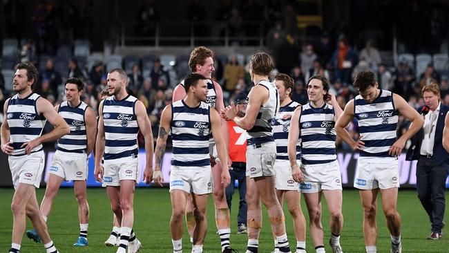 Geelong players leave the field after a round 24 loss to the Western Bulldogs. Picture: Morgan Hancock/Getty Images.