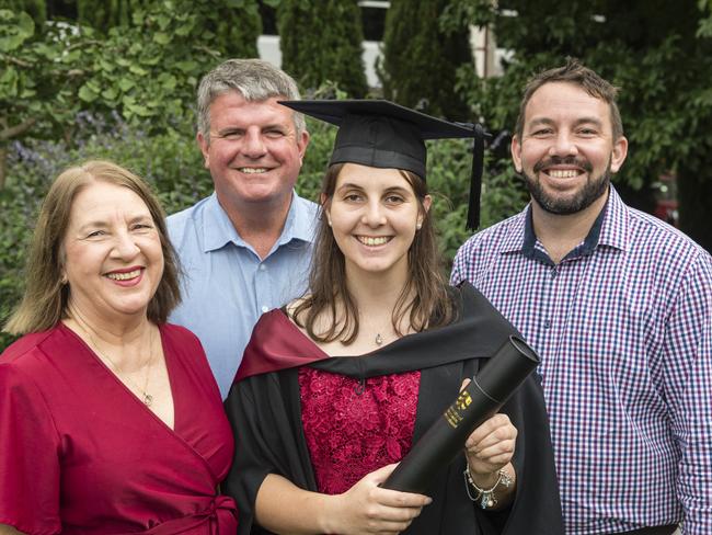 Bachelor of Engineering (Honours) (Mechatronic &amp; Robotic Engineering) graduate Jessica Gardner with Penny Gardner, Warren Gardner and Gordon Bradey (right) at a UniSQ graduation ceremony at Empire Theatres, Tuesday, February 13, 2024. Picture: Kevin Farmer