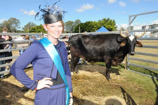 Dairy Queen Krystal Johnstonwith Dennis the bull. Picture: Craig Warhurst