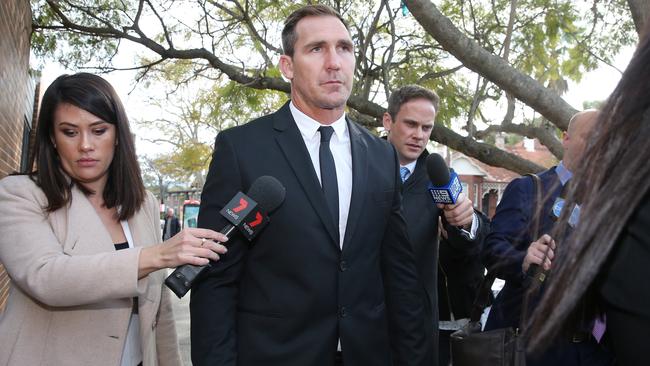 Cowboys player Scott Bolton refuses to answer questions when confronted by the media this morning. Picture: Richard Dobson