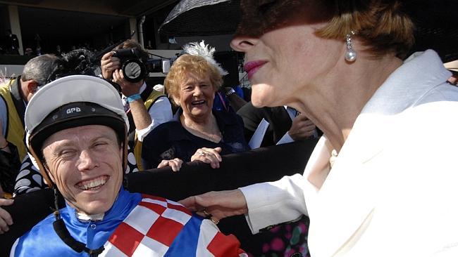 Jockey Chris Munce is congratulated by trainer Gai Waterhouse after riding Dance Hero to victory in the 2006 Salinger Stakes. Picture: Nicole Garmston 