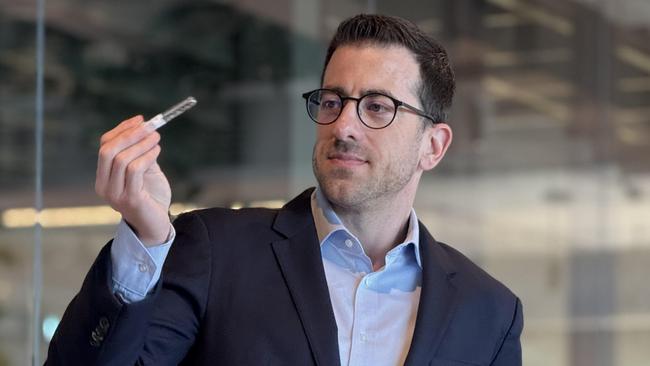 Tessara Therapeutics chief executive Dr Christos Papadimitriou with one of his company's "mini brains" in a test tube, which allows researchers to test drugs on micro-tissue that mimics the human brain.   Picture: Supplied