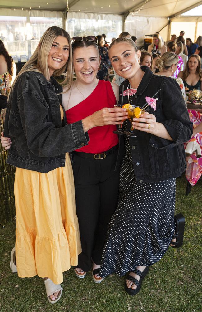 At the Sparkling Soiree Ladies Day are (from left) Steffanie Goodwin, Jacquie Fairweather and Courtney Morris hosted by Willowburn Football Club, Saturday, August 3, 2024. Picture: Kevin Farmer