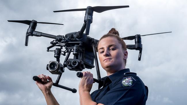 Acting Sergeant Brooke Tolley with a DJI Matrice. The Chinese drones have been blacklisted by the US due to fears they are linked back to the Chinese military. Picture: Jake Nowakowski