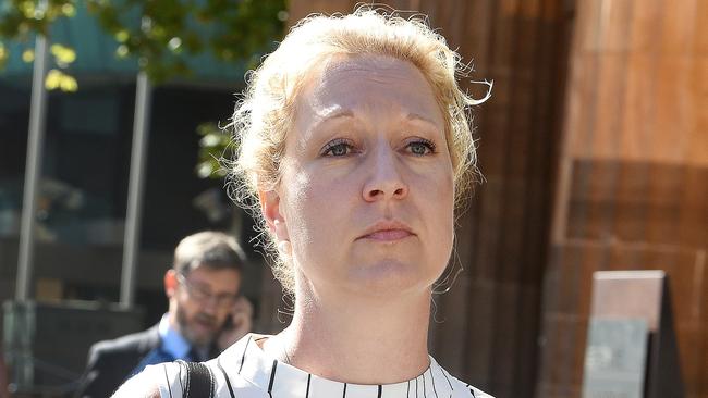 Bettina Schmoock leaves the Adelaide Magistrates Court on Wednesday. She denied child sex charges.