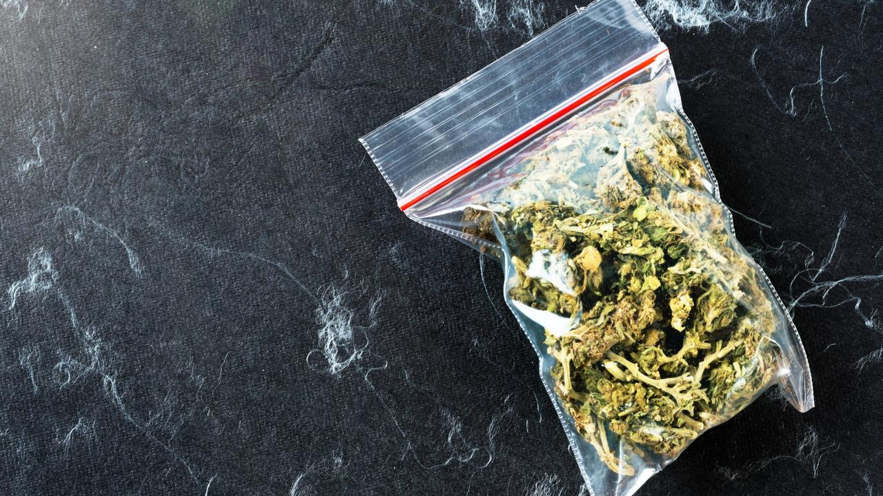 A bank bag of cannabis against a black and white background with copy space. Picture: istock