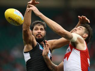 SYDNEY, AUSTRALIA - MARCH 25: Paddy Ryder of the Power and Sam Naismith of the Swans compete for the ball during the round one AFL match between the Sydney Swans and the Port Adelaide Power at Sydney Cricket Ground on March 25, 2017 in Sydney, Australia. (Photo by Mark Kolbe/Getty Images)