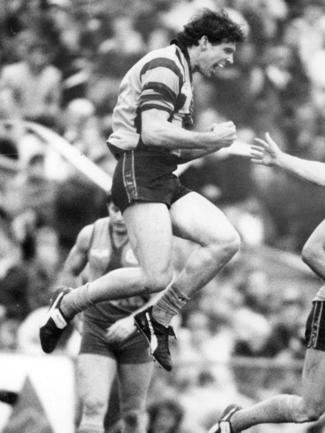 Dean Anderson celebrates a goal for Hawthorn in the 1991 Grand Final.