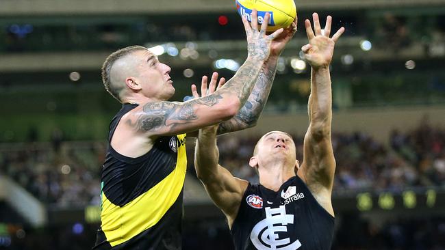 Dustin Martin gets the better of Liam Jones in Round 1. Picture: Michael Klein