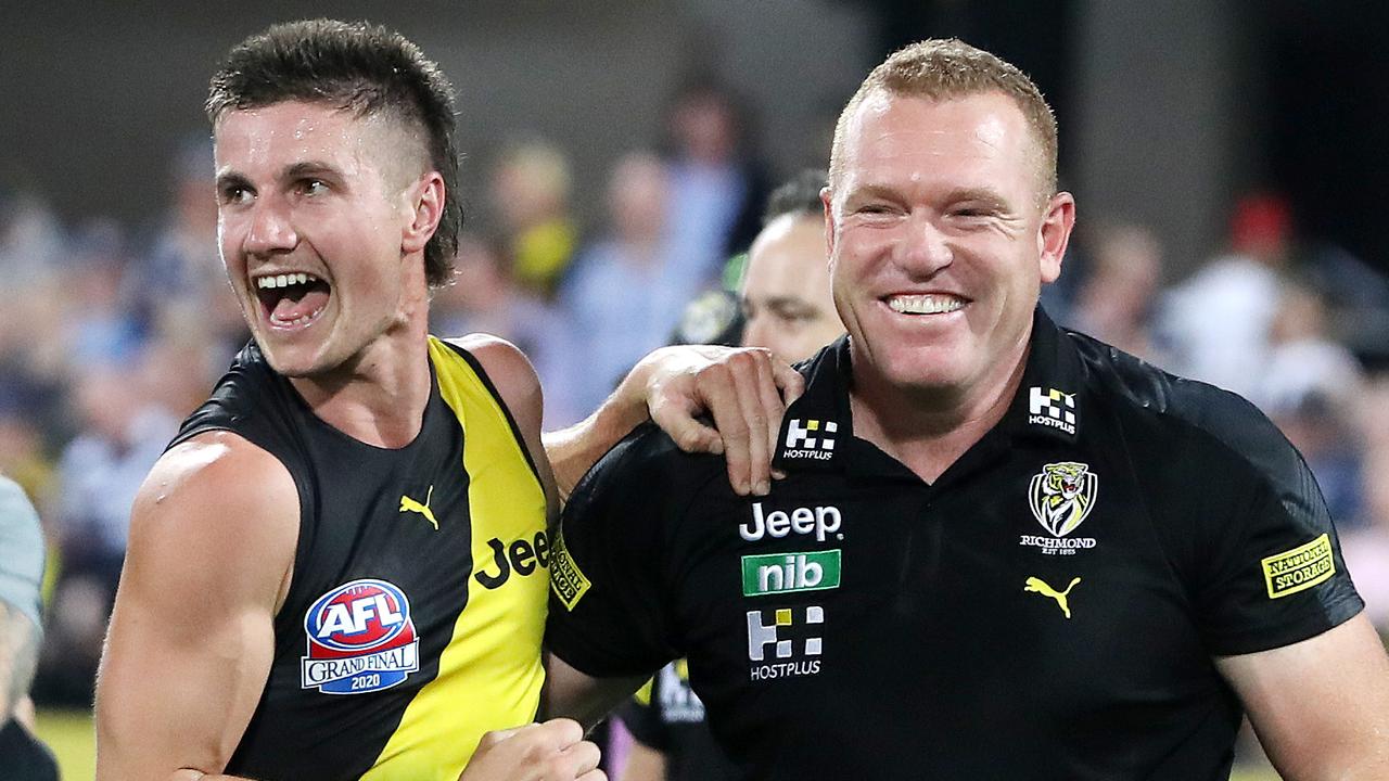 Richmond's Liam Baker and Justin Leppitsch after the win 2020 AFL Grand Final win over Geelong. Picture: Sarah Reed