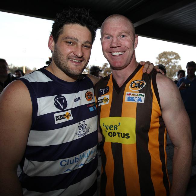 Brendan Fevola and Barry Hall after the 2012 Ovens &amp; Murray match between Yarrawonga and Wangaratta Rovers.