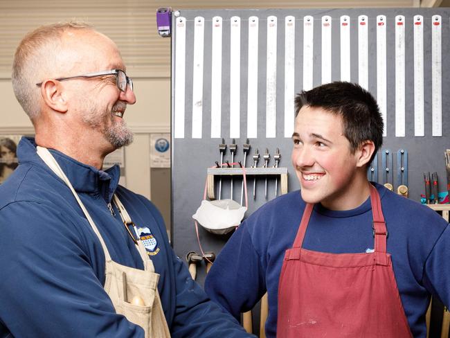 WEEKEND TELEGRAPHS. Head teacher of industrial arts at Corrimal High School Craig Mulder, with year 11 students Cullen Hoyn and Avalon Mooney in the schoolÃs brand new industrial arts building which replaces one which burnt down in 2018. Friday 03/05/2024. Picture by Max Mason-Hubers