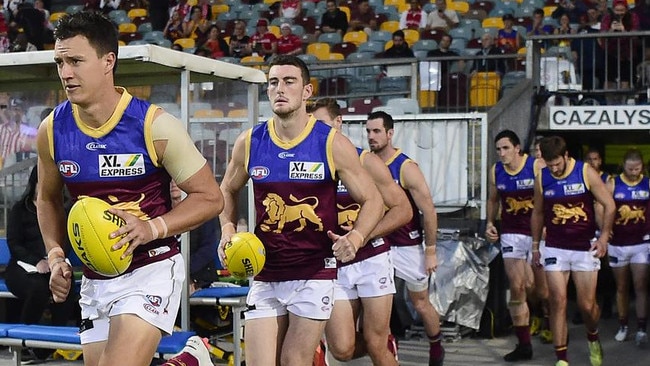 The Brisbane Lions run onto the field ahead of their clash with the Sydney Swans at Cazalys Stadium in 2020. Picture: Ian Hitchcock