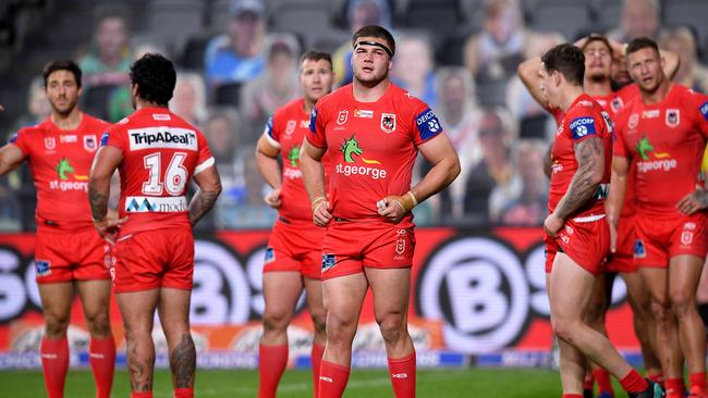 Blake Lawrie of the Dragons (centre) and teammates look on after conceding a try during the Round 4 NRL match between the Canterbury-Bankstown Bulldogs and the St George Illawarra Dragons at Bankwest Stadium in Sydney, Monday, June 8, 2020. (AAP Image/Dan Himbrechts) NO ARCHIVING, EDITORIAL USE ONLY