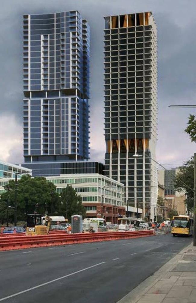 The Yugo Adelaide City building, right, at the corner of North Terrace and Frome St.