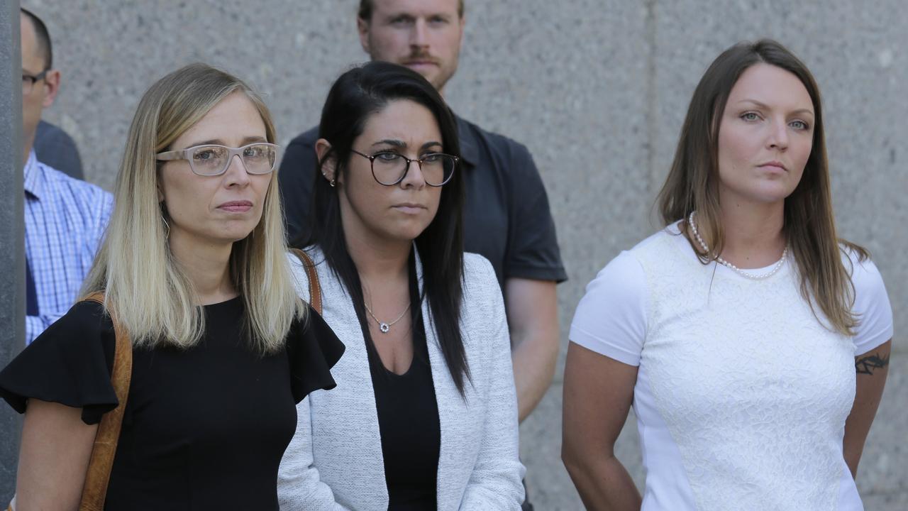 Annie Farmer (left) and Courtney Wild (right), accusers of Jeffery Epstein, stand outside the courthouse in New York on Monday, July 15. Picture: AP/Seth Wenig.