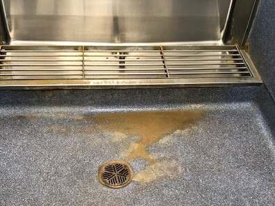 Yellow “muck” covers the floor in the children's’ toilets at Glendal Primary School.