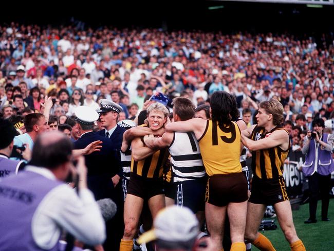 Breretin in a scuffle with Geelong's Spiro Malakellis and Steven Hocking.