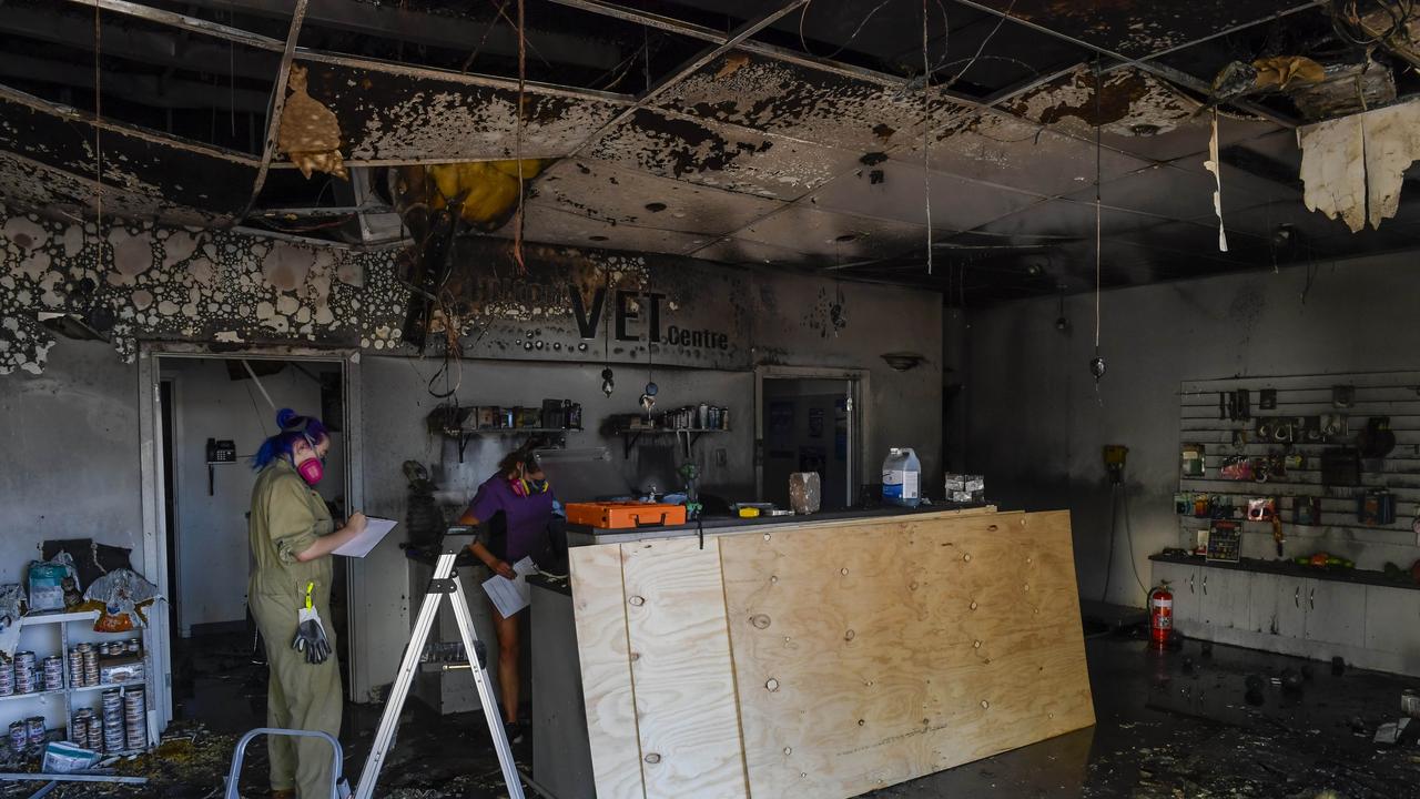 Vet nurses Jordi Shearer and Dora Williams inside the burned out Pets Health Hilton Vet Centre at Hilton. Picture: RoyVphotography