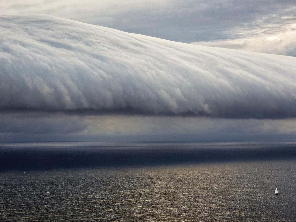 September: Roll cloud over first leg of Sydney to Hobart yacht race, New South Wales. Photograph: ©ROLEX / Carlo Borlenghi. In over 30 years following yacht races around the world, Carlo Borlenghi has only seen two roll clouds—one in Sardinia, west of Italy, in 2008; and this one, preceding a southerly buster on the first leg of the 2010 Sydney to Hobart race.