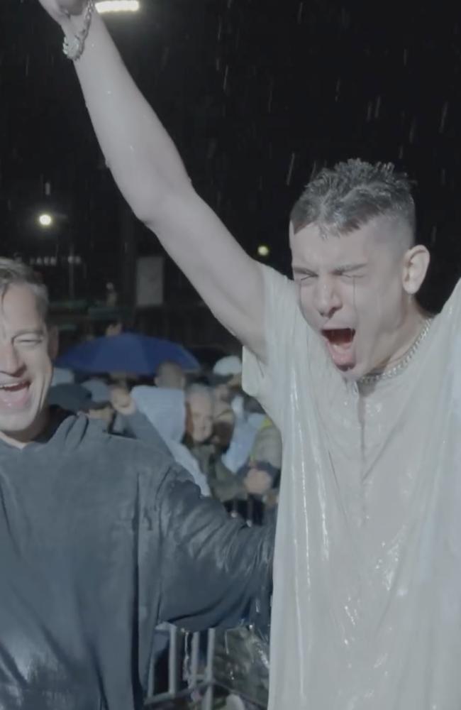 New converts were baptised in the rain during the Awakening Australia rallies at Brisbane Showgrounds.