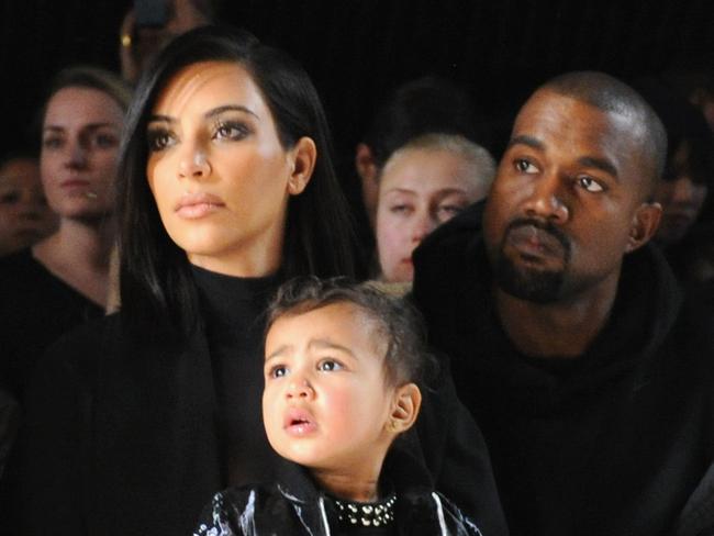 Kim Kardashian, Kanye West and daughter North West during Mercedes-Benz Fashion Week.