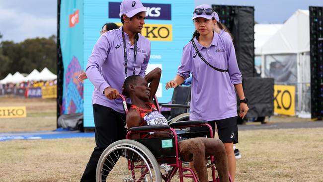 Emily Chebet of Team Kenya is seen in a wheelchair after competing