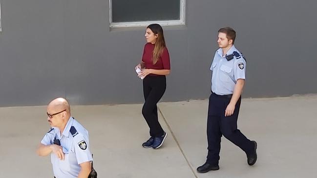 Claudia Gelonese, 26, walking free from the ACT Supreme Court cells earlier this year. Picture: Craig Dunlop