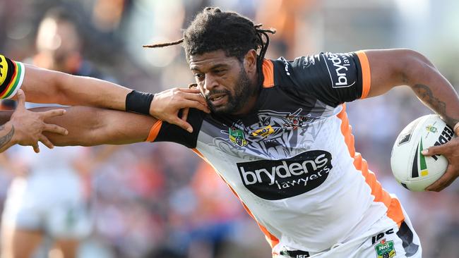 Jamal Idris of the Tigers is tackled.