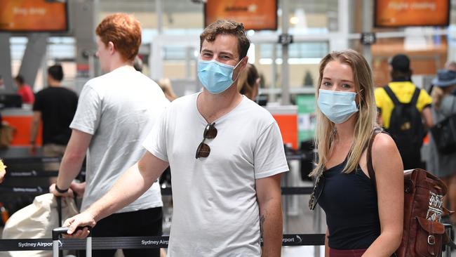 Matt and Emily Moore, 30 and 28 at the Domestic terminal at Sydney Airport in Sydney. Picture: NCA NewsWire/Joel Carrett