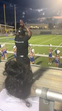 Adorable dad dances with his daughter's cheerleading squad