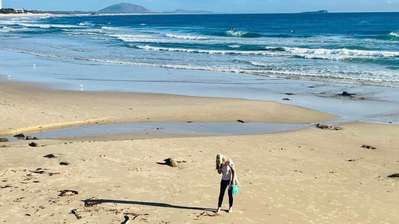 Rachael Bermingham during one of her beach clean up efforts. Picture: contributed