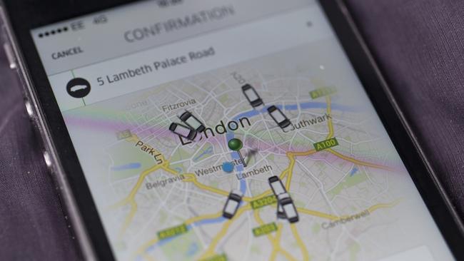 LONDON, ENGLAND - JUNE 02: In this photo illustration, a smartphone displays the 'Uber' mobile application which allows users to hail private-hire cars from any location on June 2, 2014 in London, England. The controversial piece of software, which is opposed by established taxi drivers, currently serves more than 100 cities in 37 countries. London's black cabs are seeking a High Court ruling on the claim that the Uber software is breaking the law by using an app as a taxi meter to determine rates. (Photo by Oli Scarff/Getty Images)