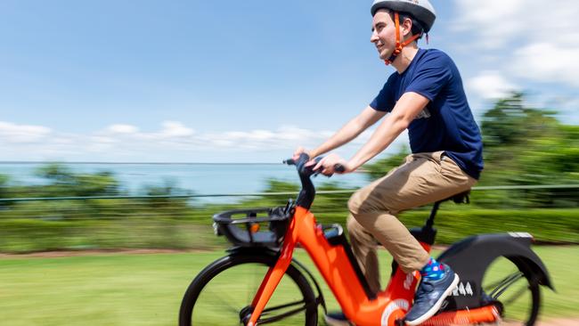 Neuron Mobility are launching a new product in Darwin. E-bikes will be available via the same system and app as their already popular e-scooters. Richard Hannah, Regional Manager at Neuron Mobility takes one of the new bikes for a spin. Picture: Che Chorley