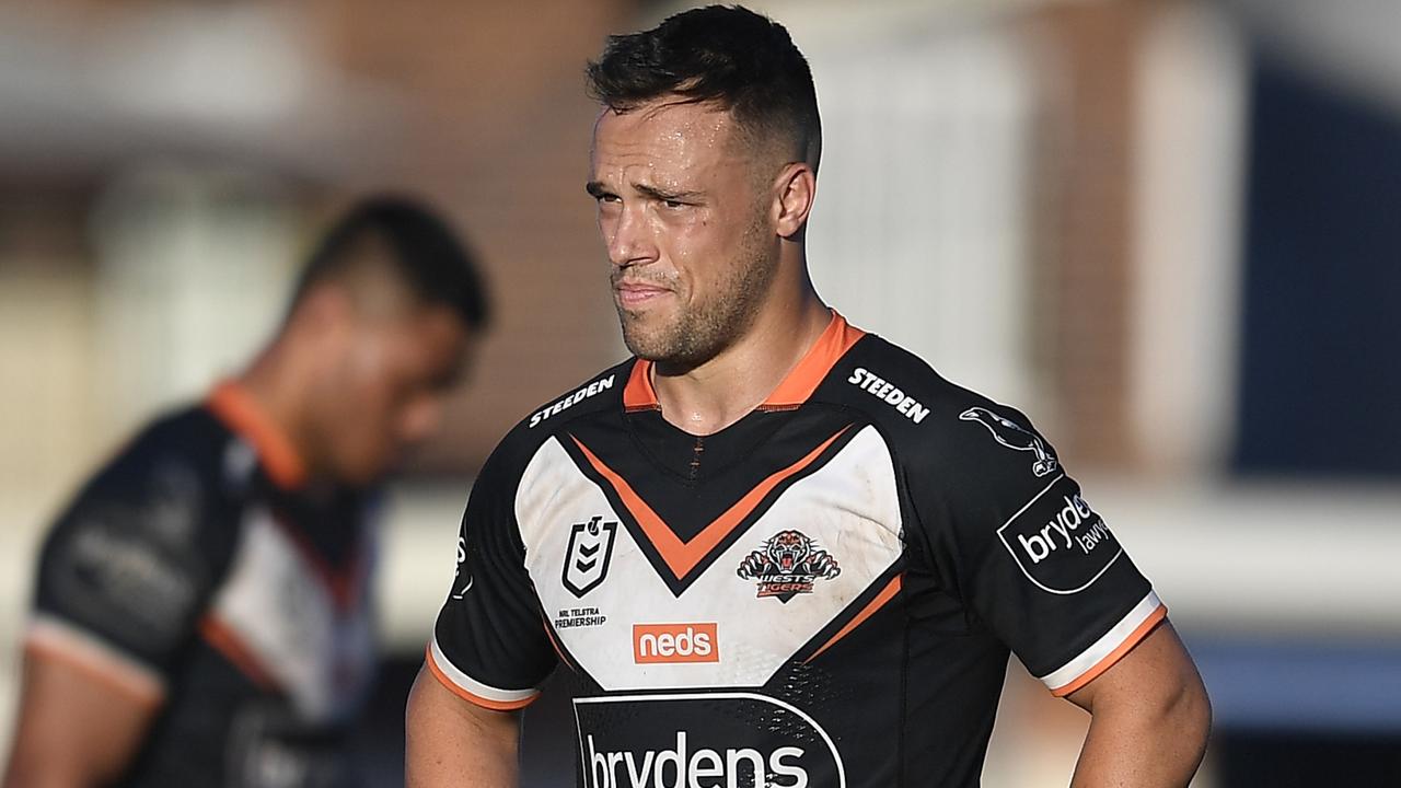 ROCKHAMPTON, AUSTRALIA - AUGUST 21: Luke Brooks of the Tigers looks dejected after losing the round 23 NRL match between the Wests Tigers and the Cronulla Sharks at Browne Park, on August 21, 2021, in Rockhampton, Australia. (Photo by Ian Hitchcock/Getty Images)