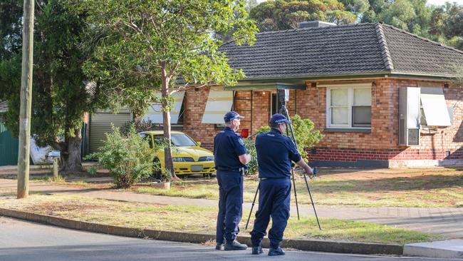 Police on scene in Peacock Rd, Elizabeth Downs where a man was found bashed on the footpath. Picture: Brenton Edwards