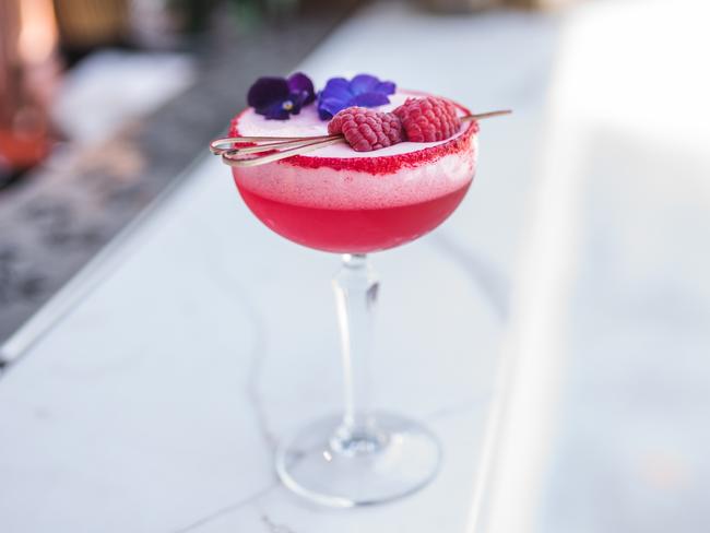 The Rose cocktail, made with Bombay gin, raspberry syrup and lemon juice.