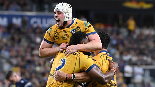 Reed Mahoney celebrates Maika Sivo’s crucial try, which put the Eels in front. Picture: Bradley Kanaris/Getty Images