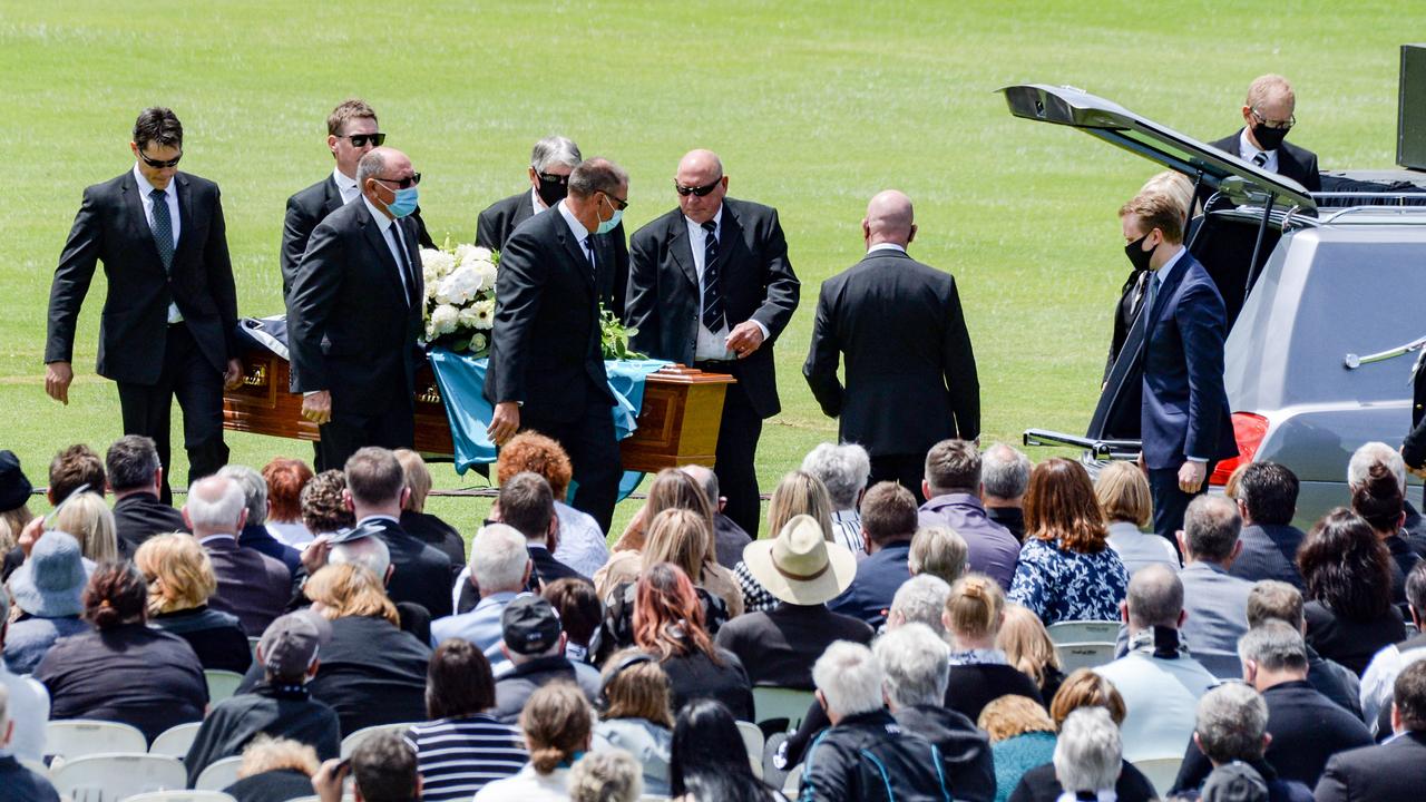 Pallbearers carry Russell Ebert’s casket to the hearse at the state funeral service at Alberton. Picture: NCA NewsWire/Brenton Edwards