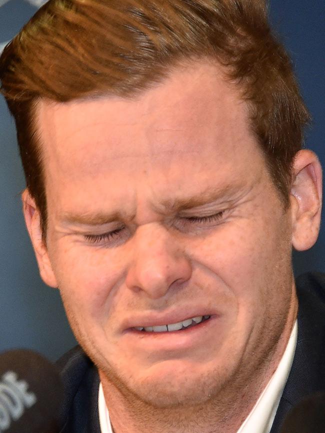 Australian cricketer Steve Smith reacts at a press conference.