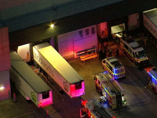 Three men have been injured in a workplace accident at the Woolworths Distribution Centre in Western Sydney. Credit: 7NEWS