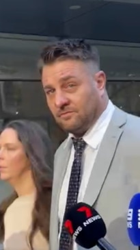 Sam Fisher arrives at court for sentencing