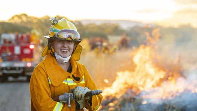 Mosquito Creek CFA volunteer Montanna Maude practices her firefighting skills on a Redesdale roadside fuel reduction burn. Pictures: Zoe Phillips