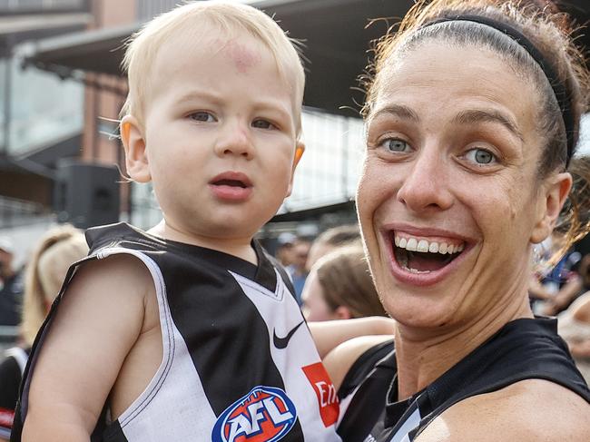 Ashleigh Brazill with son Louis after her comeback game.