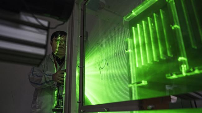 A Huawei thermal engineer performs a heat test in the research and development area of the Bantian campus in April 2019. Picture: Kevin Frayer