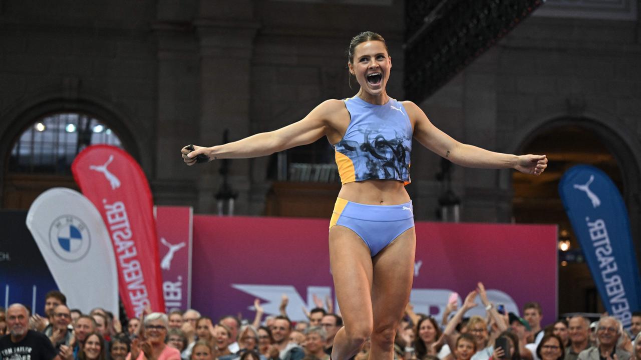 Australia's Nina Kennedy was all smiles. Photo by Fabrice COFFRINI / AFP.